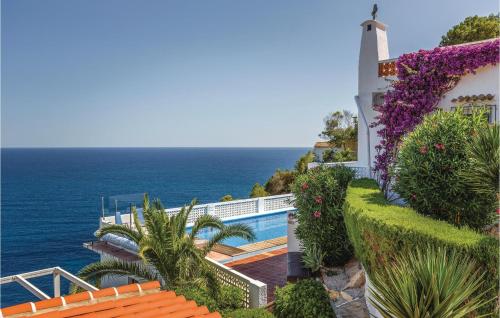 a house with a view of the ocean at Costa Nova in Jávea