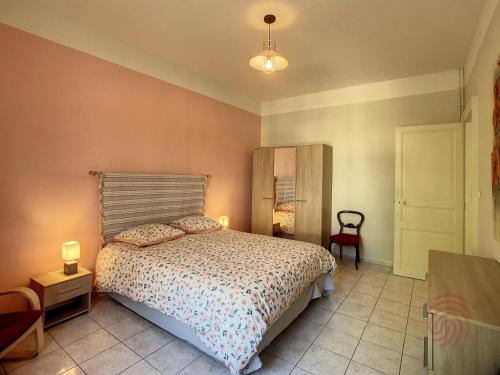 Posteľ alebo postele v izbe v ubytovaní Appartement Lamalou-les-Bains, 2 pièces, 2 personnes - FR-1-451-162