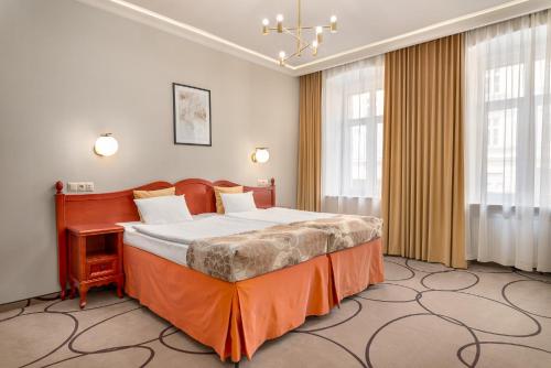 Ліжко або ліжка в номері Hotel Europejski Wrocław Centrum