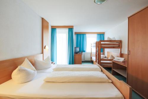 Postel nebo postele na pokoji v ubytování Hotel Tia Monte