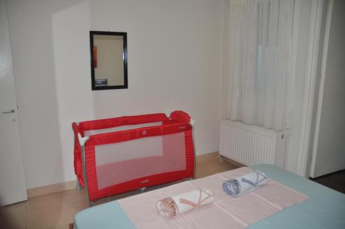 Cama ou camas em um quarto em Nakis Apartment Central