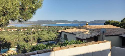a villa with a view of the ocean at La Casa di Stefania in Porto Pino