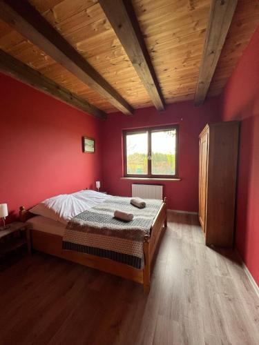 Postel nebo postele na pokoji v ubytování Dom na wynajem Mazury DOM NA WYSOKIM BRZEGU