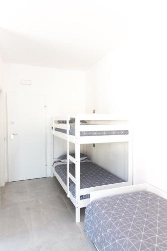 Ένα ή περισσότερα κρεβάτια σε δωμάτιο στο Bed&Biker