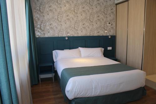Postel nebo postele na pokoji v ubytování Modo Hotel Apartamento