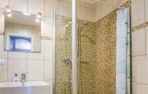 a bathroom with a shower and a sink at Costa Nova in Jávea