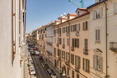 a view of a city street with buildings at Palazzo Del Carretto-Art Apartments and Guesthouse in Turin