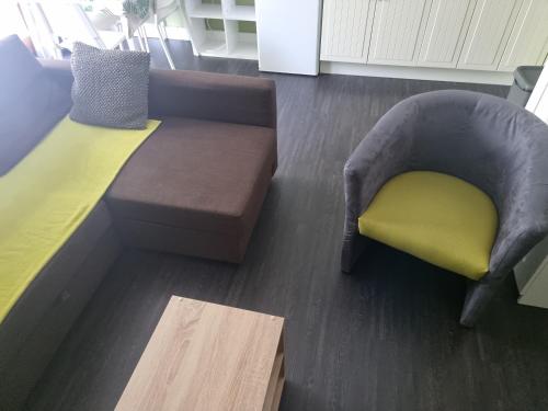 Ein Sitzbereich in der Unterkunft Vitam-Inn