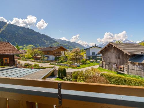 a view from a balcony of a village with houses at Apartment Rupertus-3 by Interhome in Maishofen
