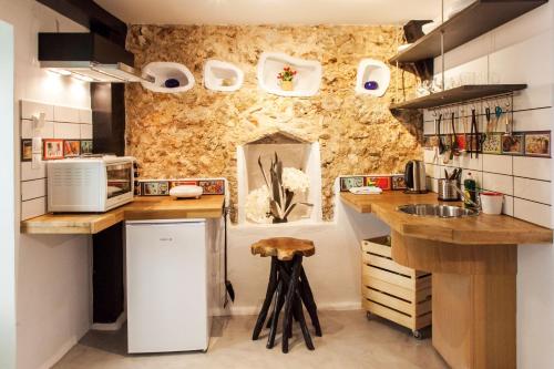 Η κουζίνα ή μικρή κουζίνα στο Lefkayo Apartment