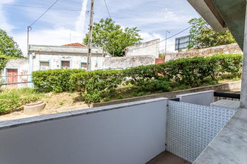 a view from the balcony of a house at Real Home in Sacavém