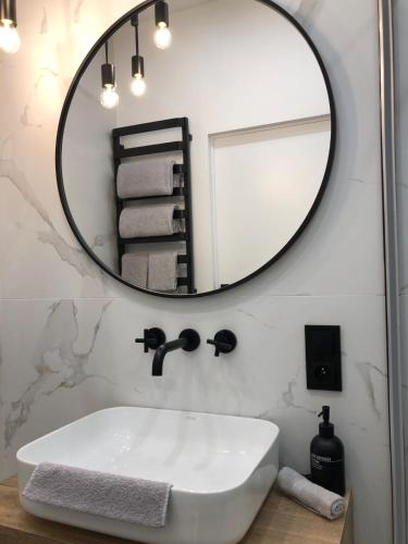 Ένα μπάνιο στο Apartments Kwidzyn