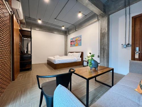 Postel nebo postele na pokoji v ubytování Loft 202 Hotel