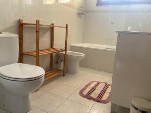 Een badkamer bij Apartamento en Colombres