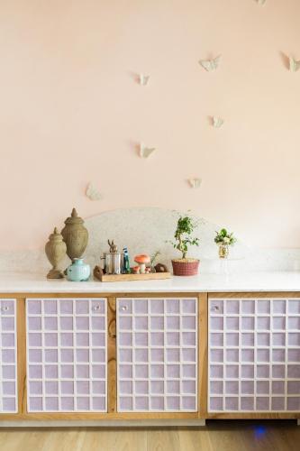 a kitchen with a counter top and a shelf at Ancient Lore Village in Knoxville