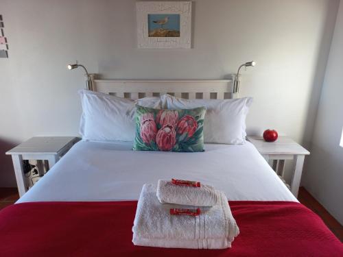 Postel nebo postele na pokoji v ubytování Abalone Guesthouse
