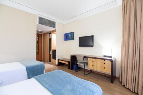 Μια τηλεόραση ή/και κέντρο ψυχαγωγίας στο Golden Tower Pinheiros by Fênix Hotéis