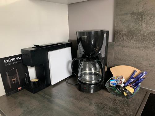 a blender sitting on a counter next to a box at Ferienhaus Alte Kaserne in Andernach
