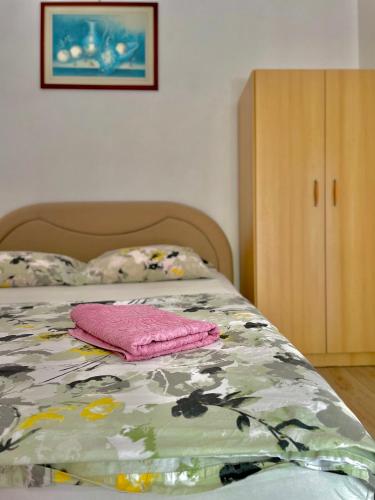 Postel nebo postele na pokoji v ubytování Apartments Neven