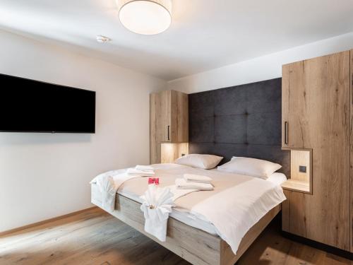 Krevet ili kreveti u jedinici u okviru objekta Apartment Emma Deluxe Aparthotel-4 by Interhome