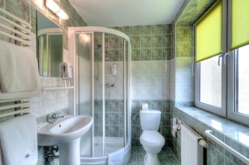 Kúpeľňa v ubytovaní Hotel Petrus