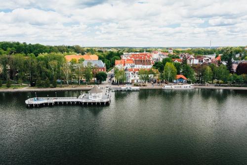 an aerial view of a large body of water at Willa Port Apartament Premium z widokiem na jezioro in Ostróda