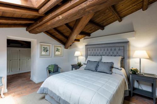 Een bed of bedden in een kamer bij CORTE SAGGIN Charme Relais