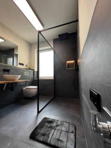 Ένα μπάνιο στο Ferienwohnung Ströbitzer Wiesen