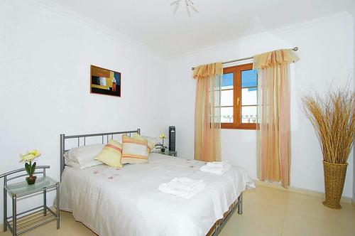 Postel nebo postele na pokoji v ubytování Villa Amaryills