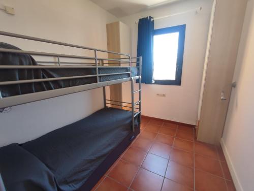 Posteľ alebo postele v izbe v ubytovaní MSJ 57 Apartamento en Marina Sant Jordi