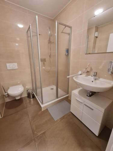 Phòng tắm tại check-inn hotels - Offenbach
