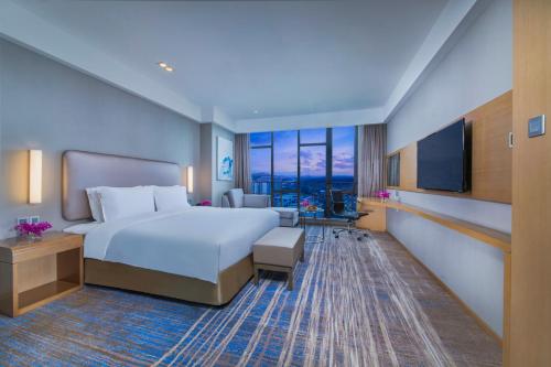 Ένα ή περισσότερα κρεβάτια σε δωμάτιο στο Holiday Inn Express Guian Yungu by IHG