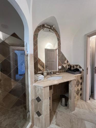 Phòng tắm tại Residence Sherden, Appartamento Spiaggia Bianca