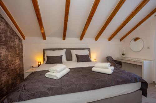 Posteľ alebo postele v izbe v ubytovaní Stone House Iris