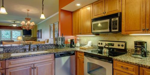 a kitchen with a sink and a stove top oven at RiverStone Condo Resort & Spa in Pigeon Forge