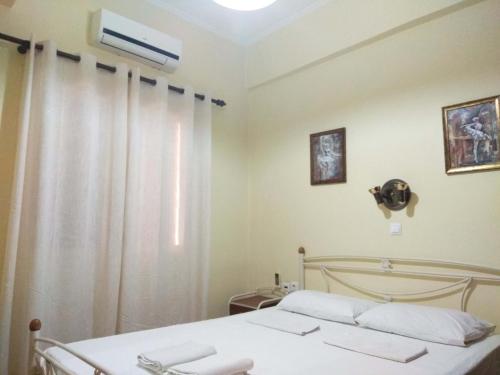 Postel nebo postele na pokoji v ubytování OLEA Apartments