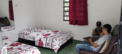 Voodi või voodid majutusasutuse Hotel Yamboró toas