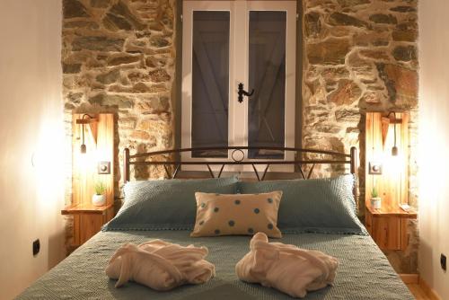 Een bed of bedden in een kamer bij Tramuntana