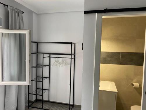 Våningssäng eller våningssängar i ett rum på NUEVO!!! PISO CENTRICO EN SUANCES -Sol Luxury-