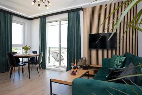Μια τηλεόραση ή/και κέντρο ψυχαγωγίας στο Luxus Apartament Tulipan