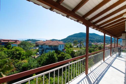 a view from the balcony of a house at chris apartement in Nydri