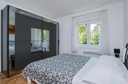 Posteľ alebo postele v izbe v ubytovaní Apartman MAMI-KROK