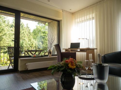 Сад в Hotel Landhaus Berghof