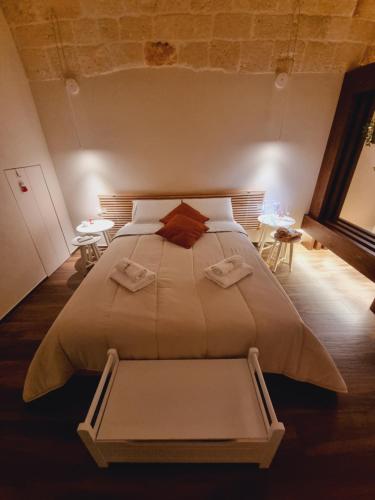 מיטה או מיטות בחדר ב-La Casupola