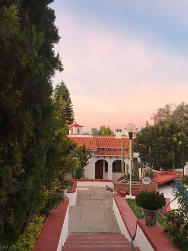 a view of a building with a pathway at Villas Tequisquipan in Tequisquiapan