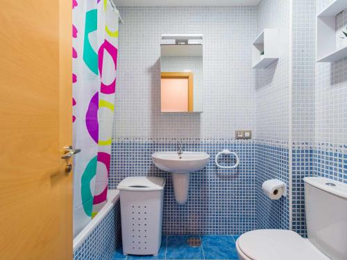 a bathroom with a sink and a toilet at Mahostly La Casita de mi Rosita in Puerto del Rosario