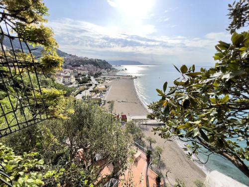 a view of the beach from a hill at Due Relais - Panoramic Sea View Suites in Vietri