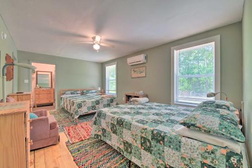 A bed or beds in a room at Bright Converted Schoolhouse in Chesterfield!