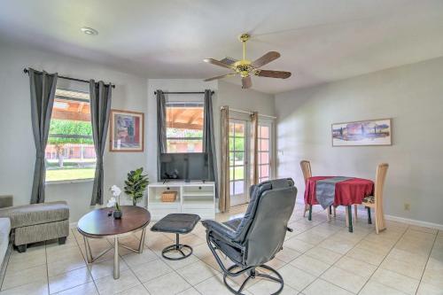 a living room with a ceiling fan and a table at Best Nights Sleep Apt Near Skydive Arizona in Eloy