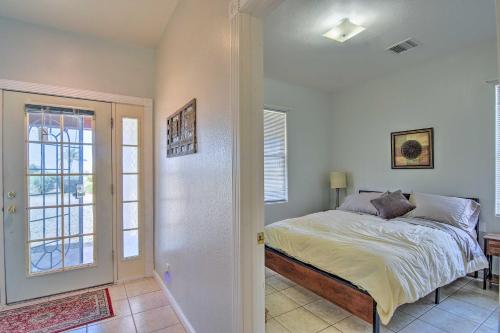 a bedroom with a bed in a room with a window at Best Nights Sleep Apt Near Skydive Arizona in Eloy